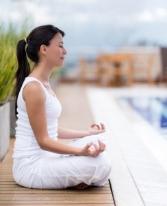 Woman Meditating Outdoors